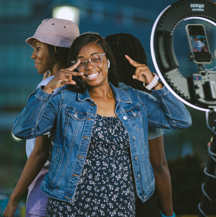 A group of young women taking a 360 photo