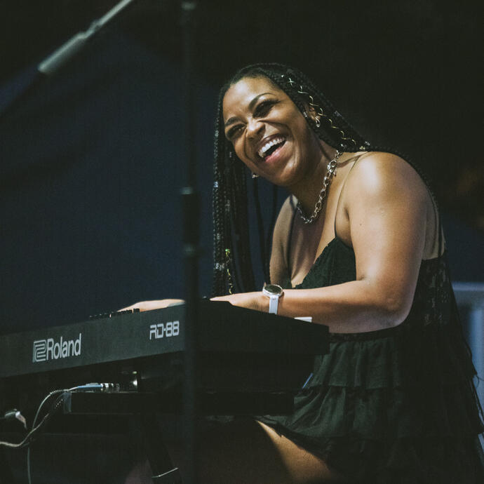 A female pianist laughing